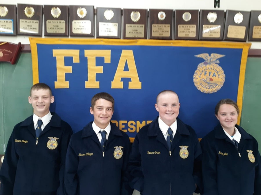 Freshmen FFA members get their first blue corduroy jackets in memory of Richard Beier from the class of 66